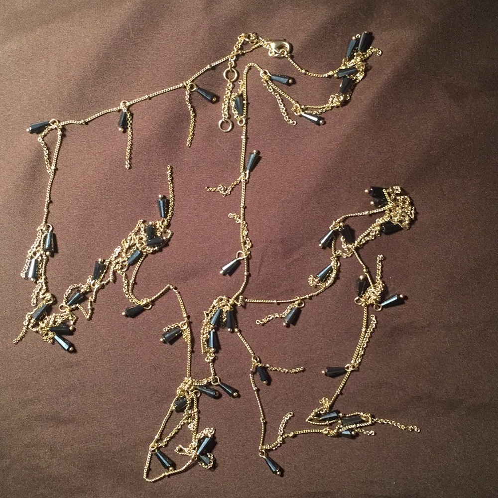 Anthro, long beautiful gold necklace